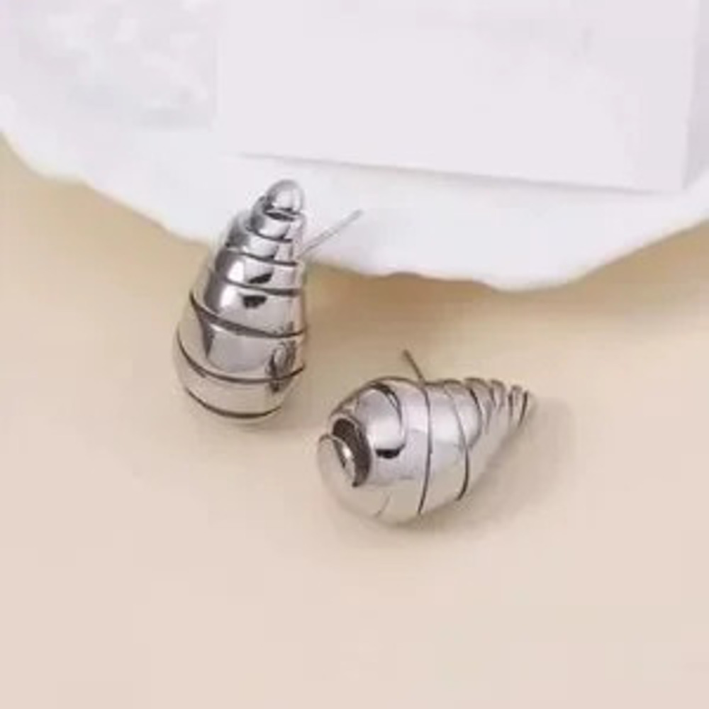 Silver Earrings and Glitter Clutch